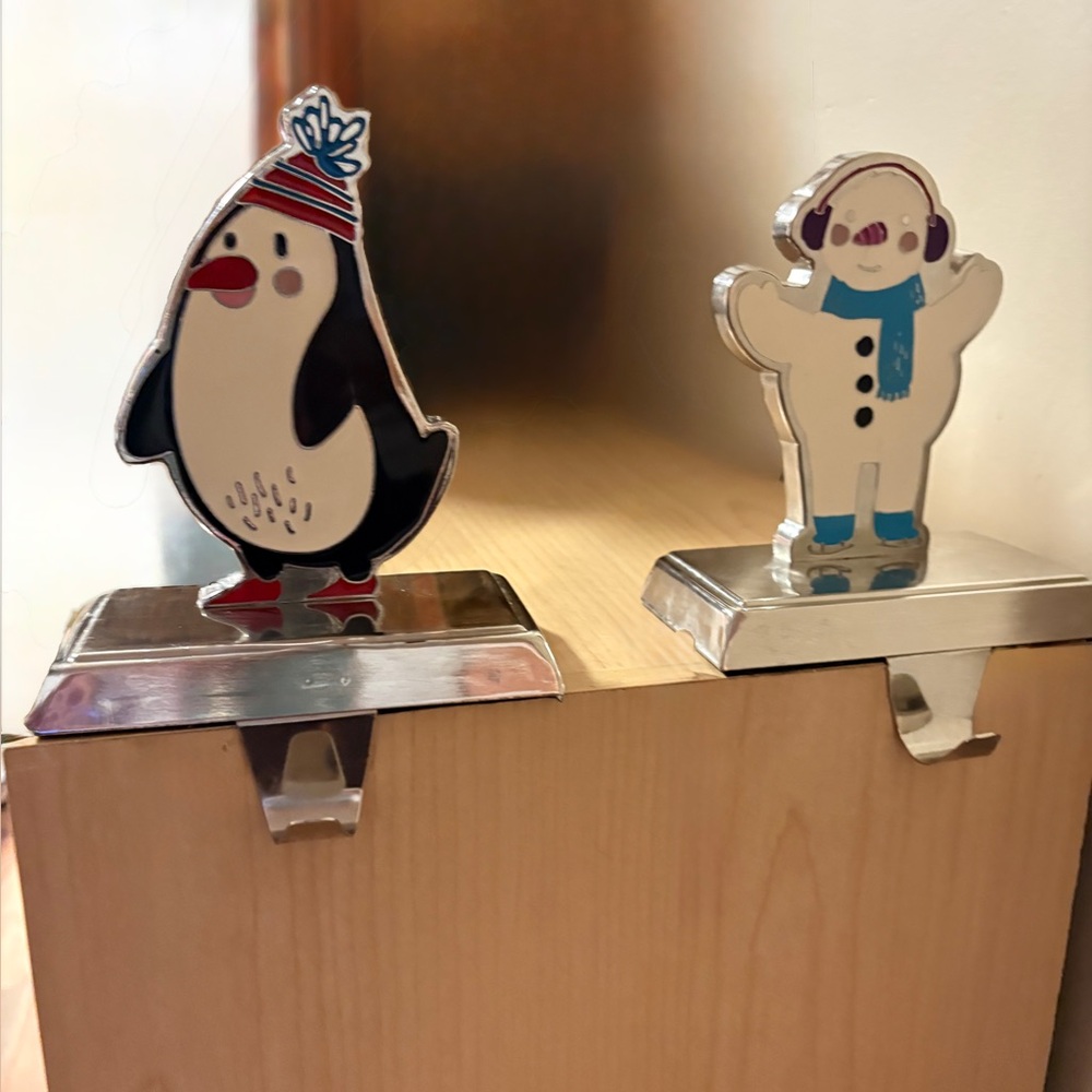Enamel vintage metal stocking holders. Snowman, Snowman . Chrome metal.